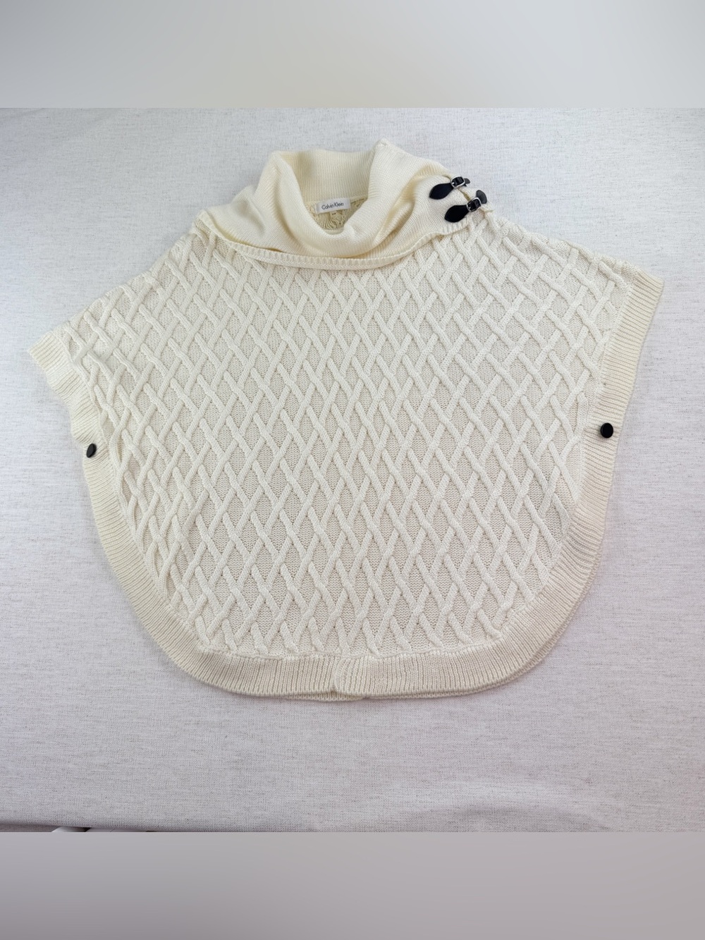 Calvin Klein Cream Cable-Knit Turtleneck Poncho cape with Button Details women S